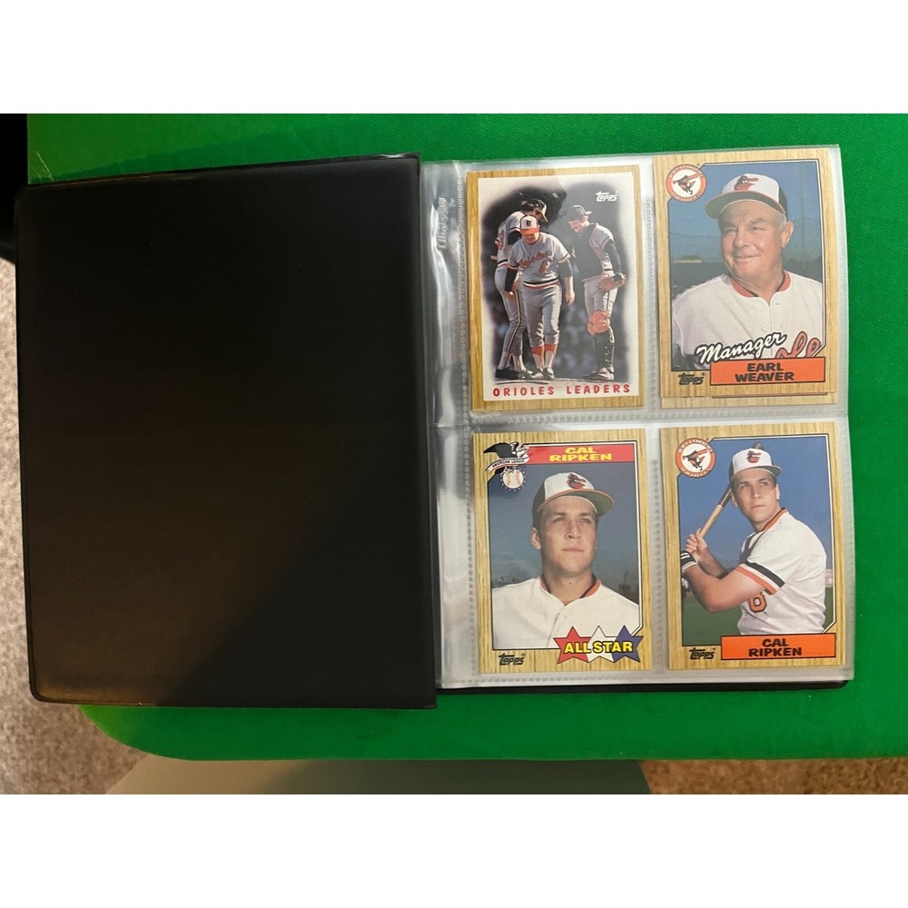 Baltimore Orioles 1987 Topps Team Set with 40 card collector album.